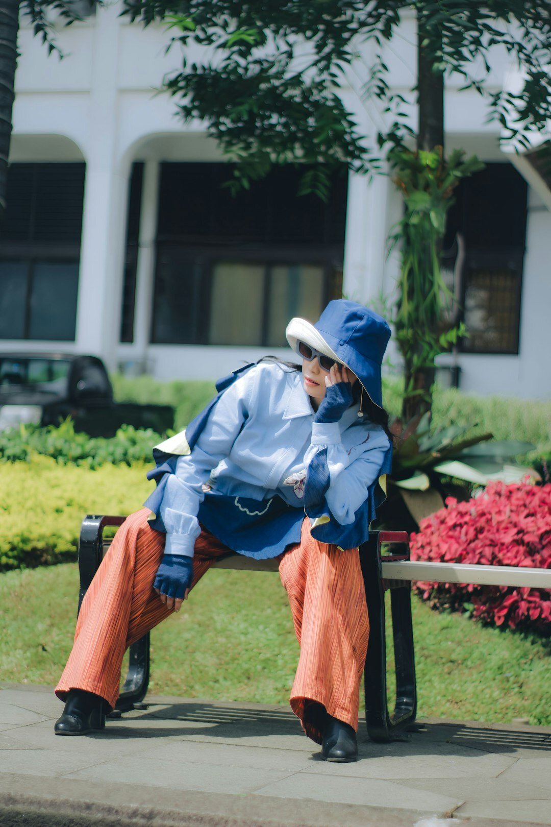 elderly woman talking on bench