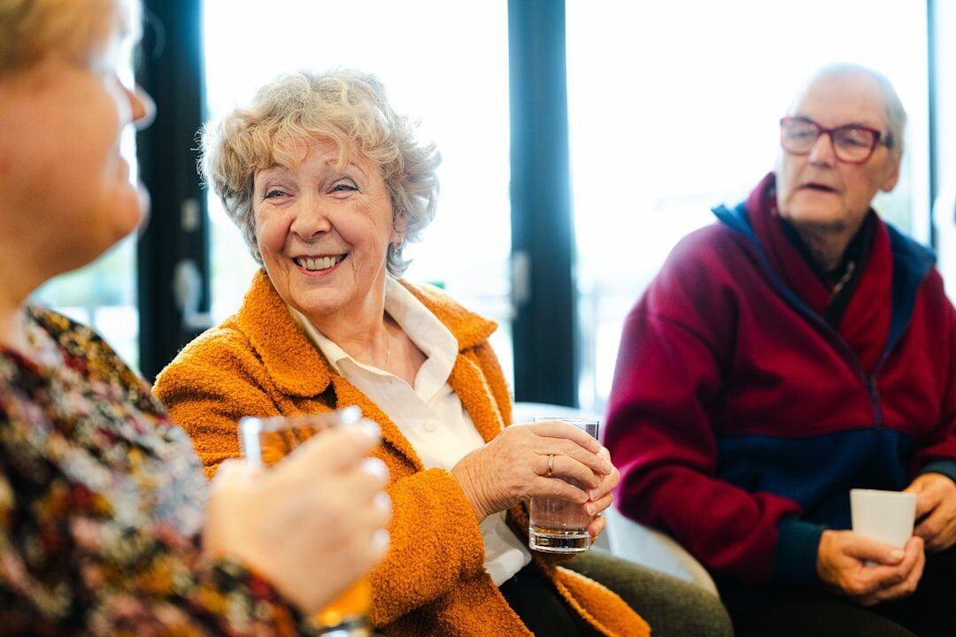 women knitting group laughing